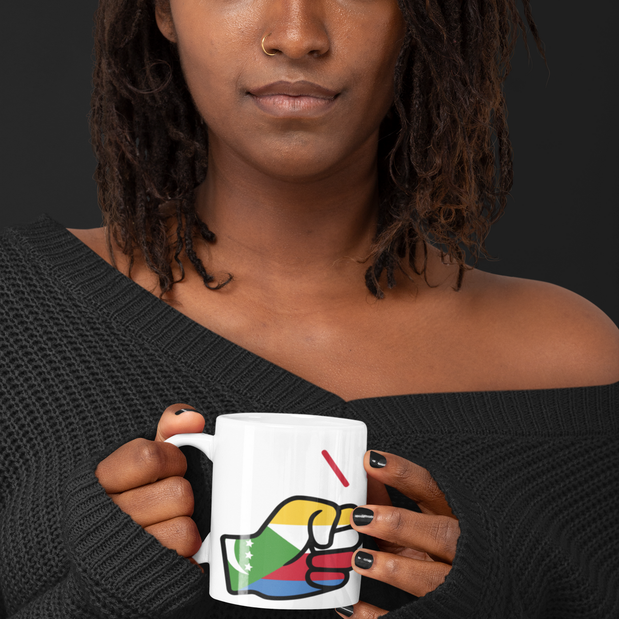 African Woman holding a We Run Tings mug with a colorful Comoros Flag themed coffee mug against a dark background