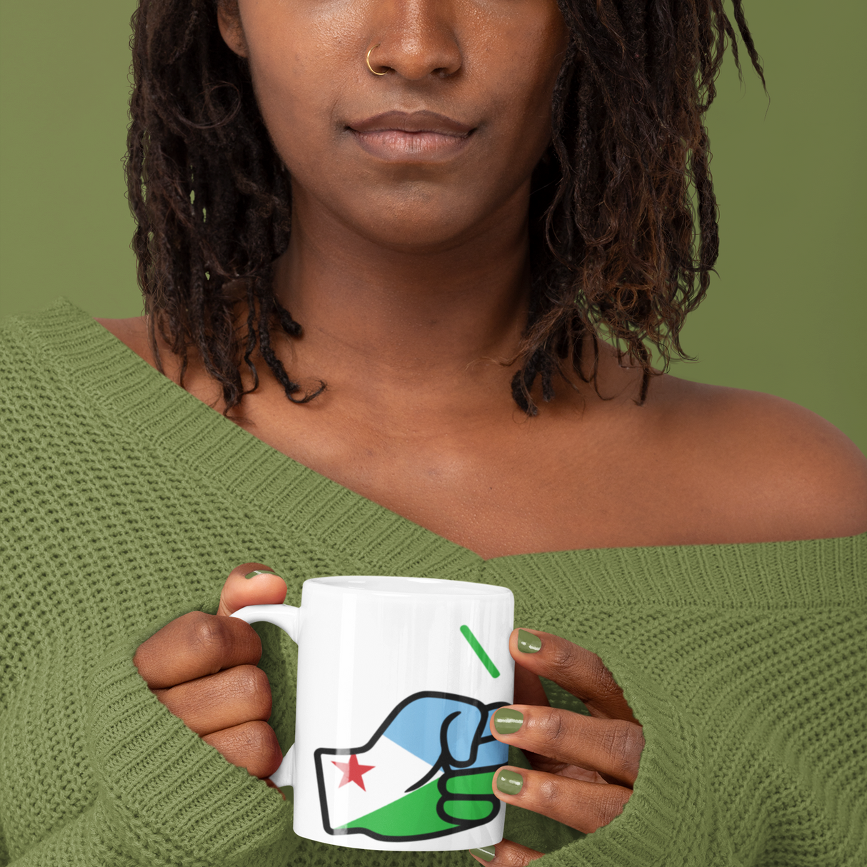 Woman holding a white ceramic We Run Tings Djibouti coffee mug against a green background