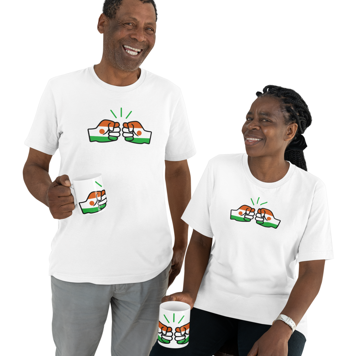 A black African couple wearing Niger themed We Run Ting merchandise. Both holding white ceramic tea coffee mugs, cups and white branded t-shirts.