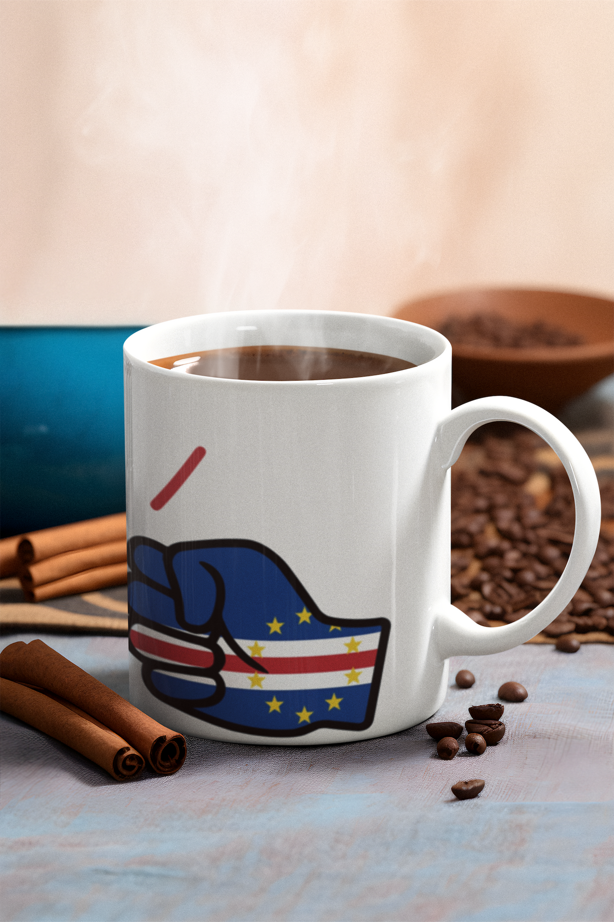 We Run Tings white mug with a Cabo Verde/Cape Verde flag, filled with coffee, on a table with coffee beans and cinnamon sticks.