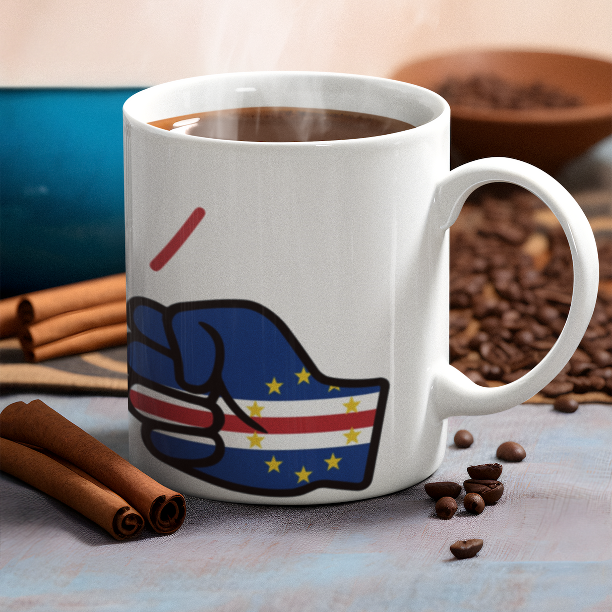 We Run Tings white mug with a Cabo Verde/Cape Verde flag, filled with coffee, on a table with coffee beans and cinnamon sticks.