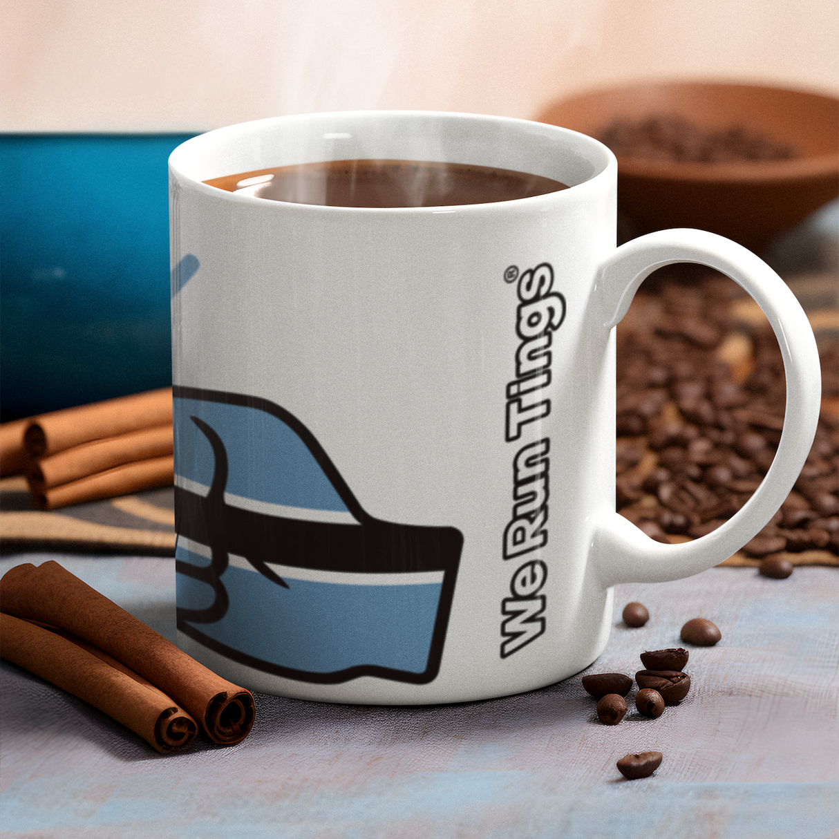 White We Run Tings coffee mug featuring the flag of Botswana with cinnamon sticks, and coffee beans on a light surface