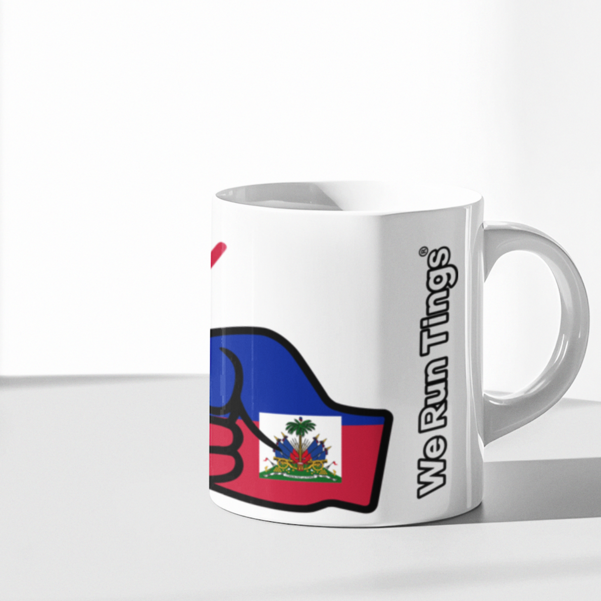 White We Run Tings Haiti mug with colorful design and text on a white surface