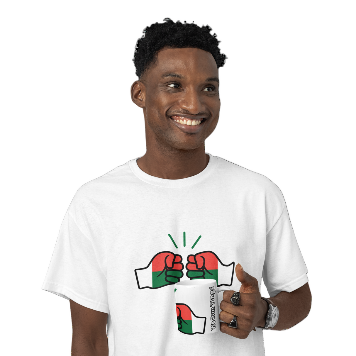 Man smiling wearing a white t-shirt with a graphic We Run Tings Madagascar logo and holding a ceramic coffee mug in the same design on a white background