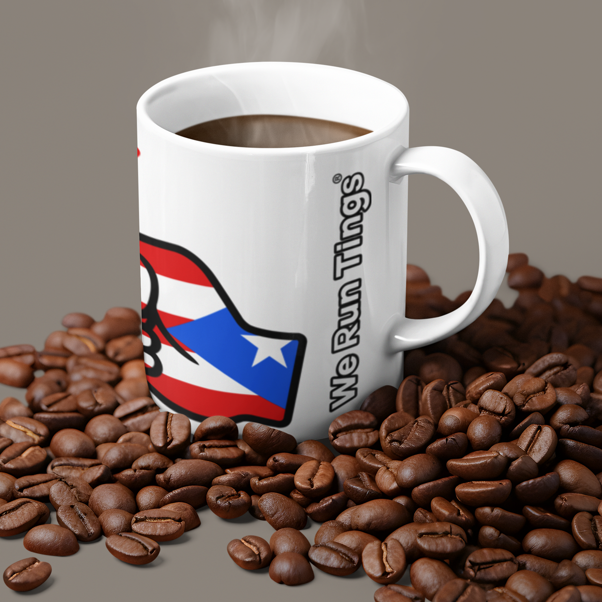 White We Run Tings Puerto Rico white ceramic mug with a logo and text on a pile of coffee beans against a gray background
