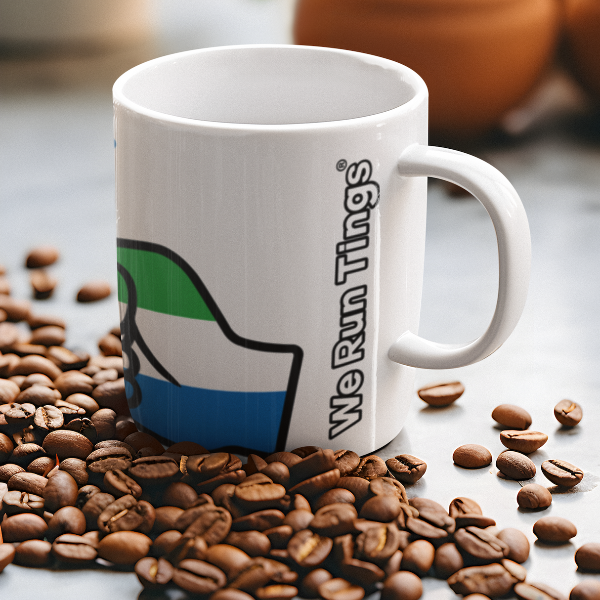 We Run Tings, Sierra Leone White mug with the flag of the country in the logo design on a surface with coffee beans