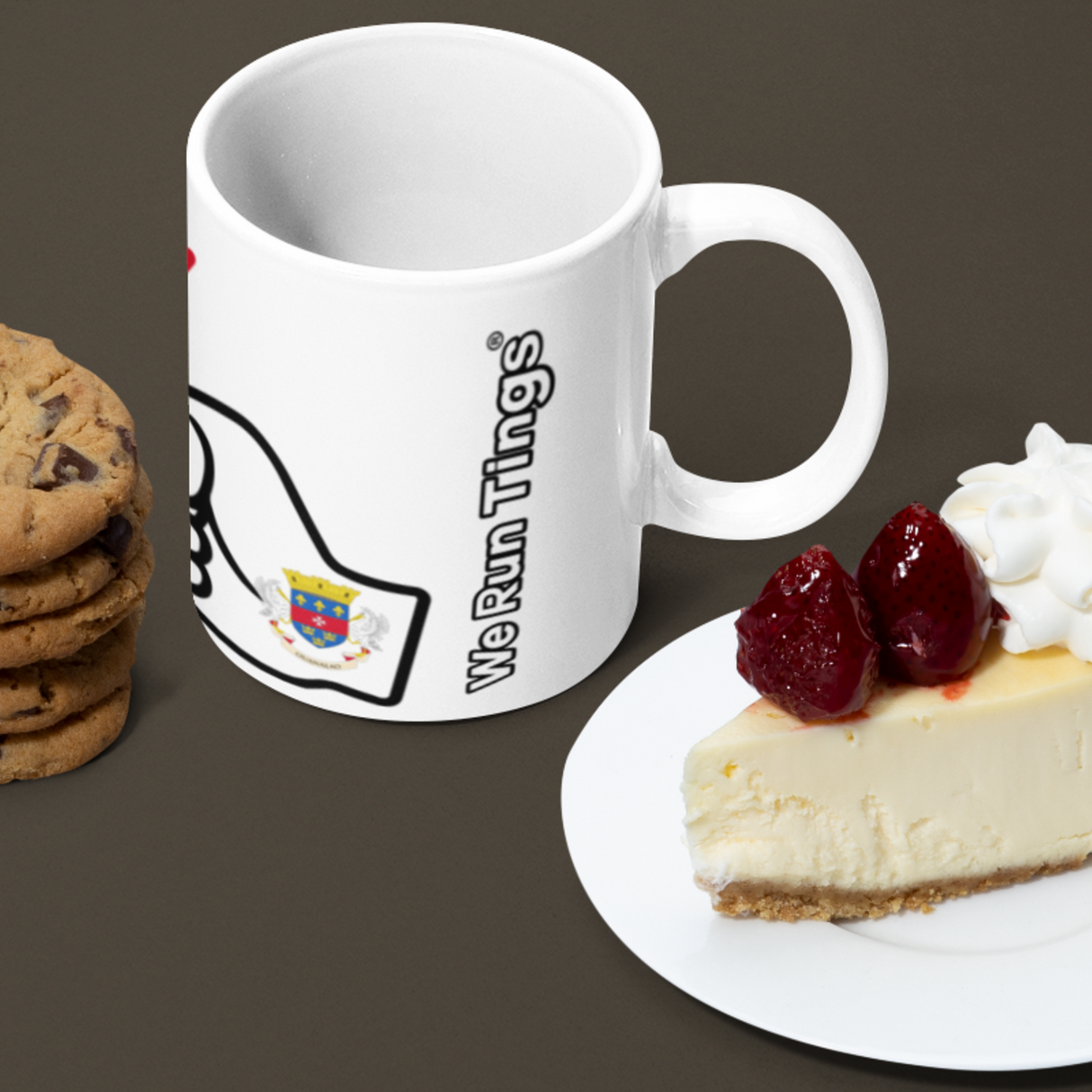 We Run Tings, St Barts, Caribbean Themed, Tea, Coffee Ceramic Mug, Cup, White, 11oz Classic Drinkware Washable Reusable Reuse Tumbler Patriotic Featuring Cookies, a mug with a logo, and a slice of cheesecake on a brown background