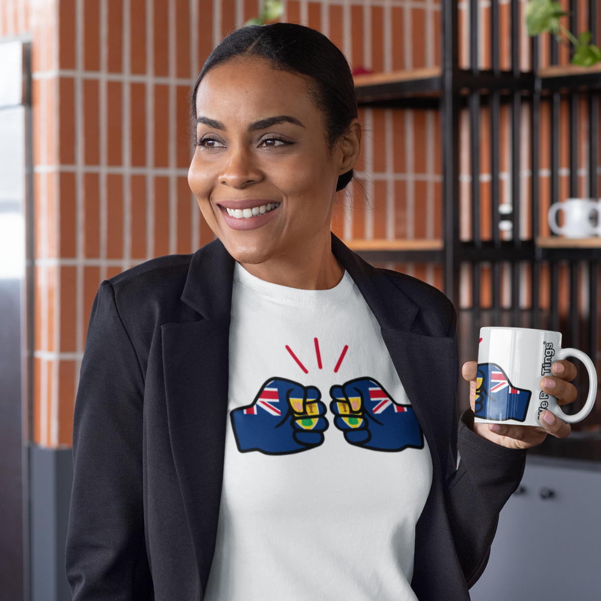 Woman in a kitchen wearing a white t-shirt with colorful designs and holding a matching We Run Tings, Turks and Caicos, Caribbean Themed, Tea, Coffee Ceramic Mug, Cup, White, 11oz Classic Drinkware Washable Reusable Reuse Tumbler Patriotic.