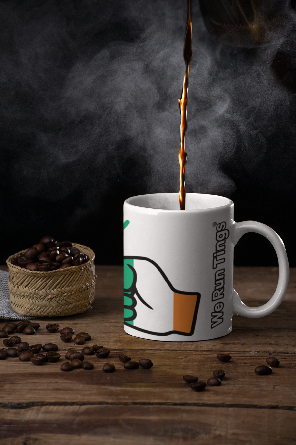 White We Run Tings Cote d’Ivoire/Ivory Coast Mug with a brand logo being filled with steaming coffee, surrounded by coffee beans on a wooden surface.