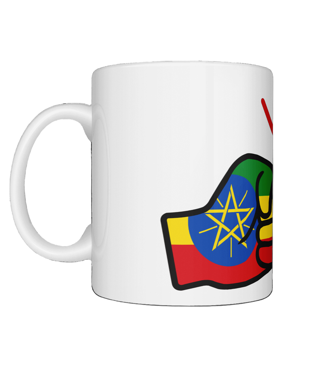A glossy white ceramic We Run Tings Ethiopia Mug with a graphic design of a fist and the colors of the Ethiopia flag. Side view
