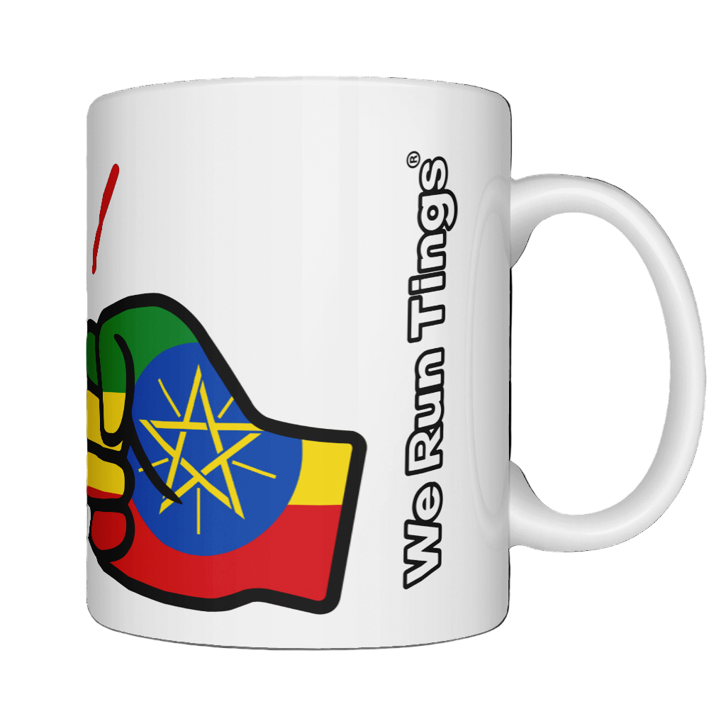 A glossy white ceramic mug with a graphic design of Ethiopia flag and the brand 'We Run Tings' on a white bakground.