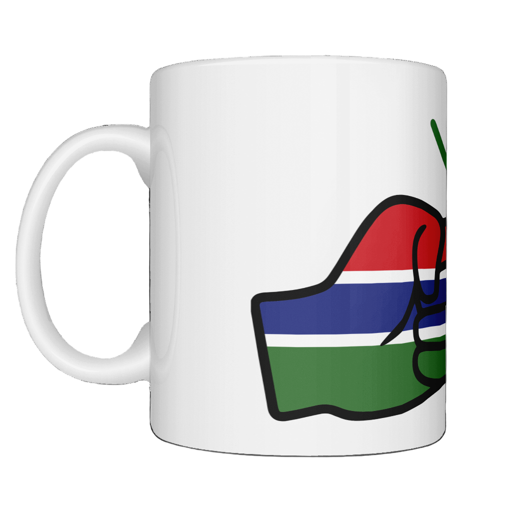 A glossy white ceramic mug with a graphic design of the flag of Gambia and the brand 'We Run Tings'. on a white background