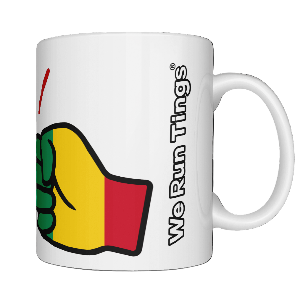 White ceramic We Run Tings Guinea mug with a colorful fist graphic and 'We Run Ting' text on a white background