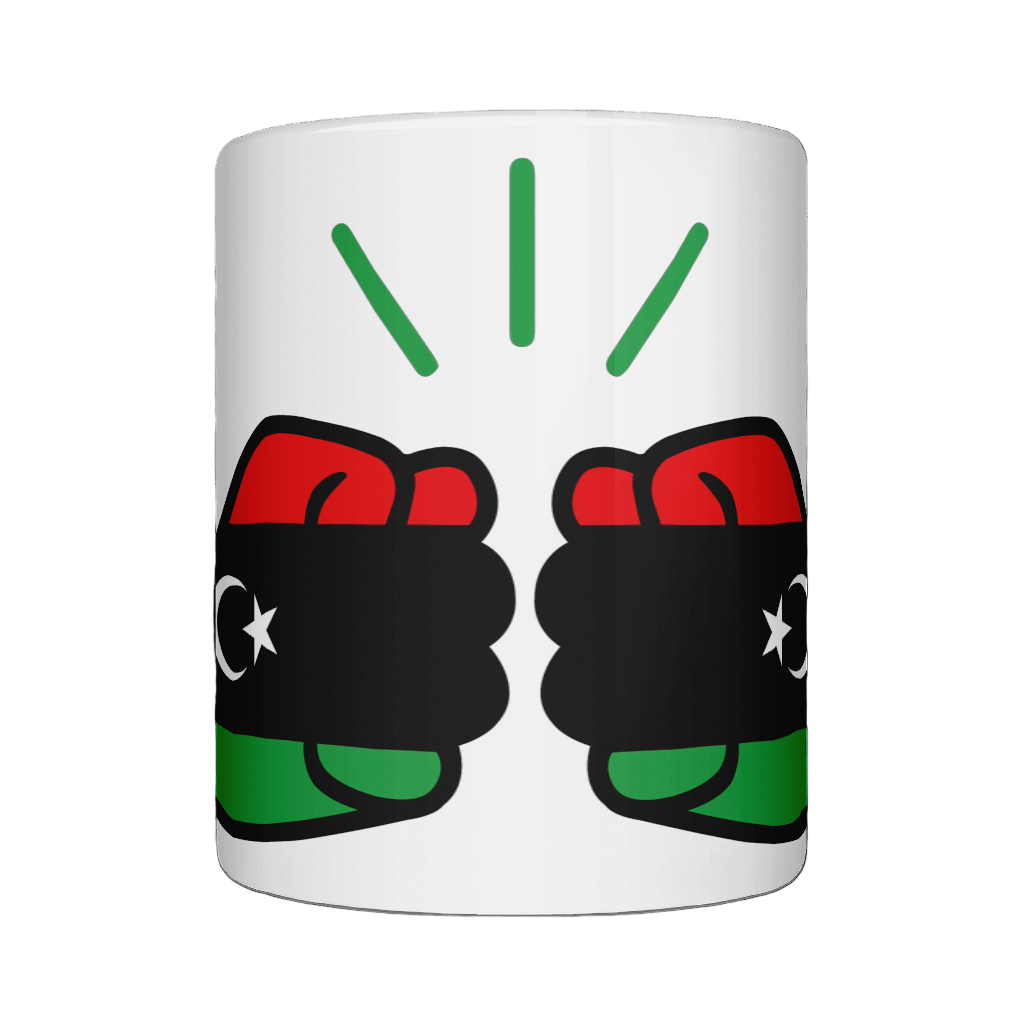 A glossy white ceramic mug We Run Tings Libya mug with a graphic design featuring clenched fists and the colours of the Libyan flag. Front view on a white background