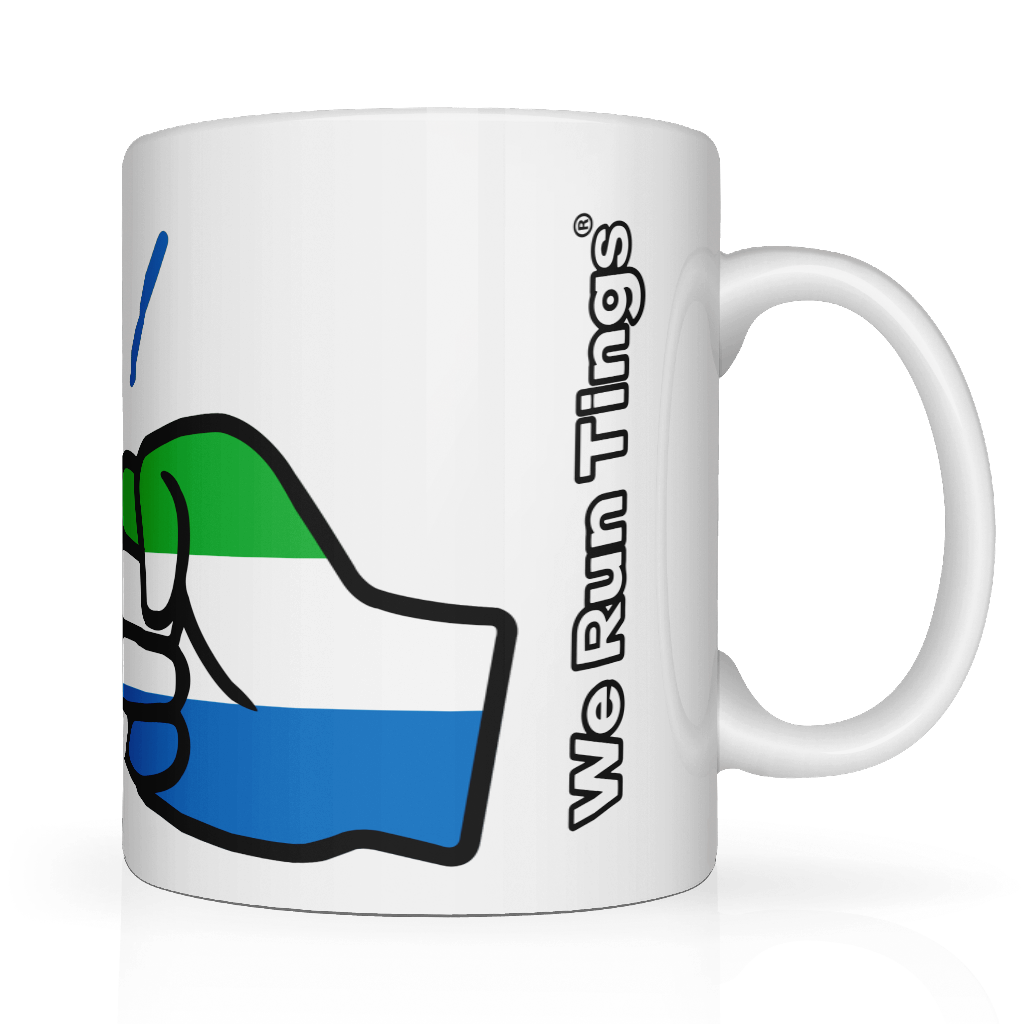 Side view of a glossy white ceramic coffee, tea mug with a graphic design of a fist featuring the We Run Tings Logo and the colours of the Sierra Leone flag, indicating a theme or message related to the country. Side view