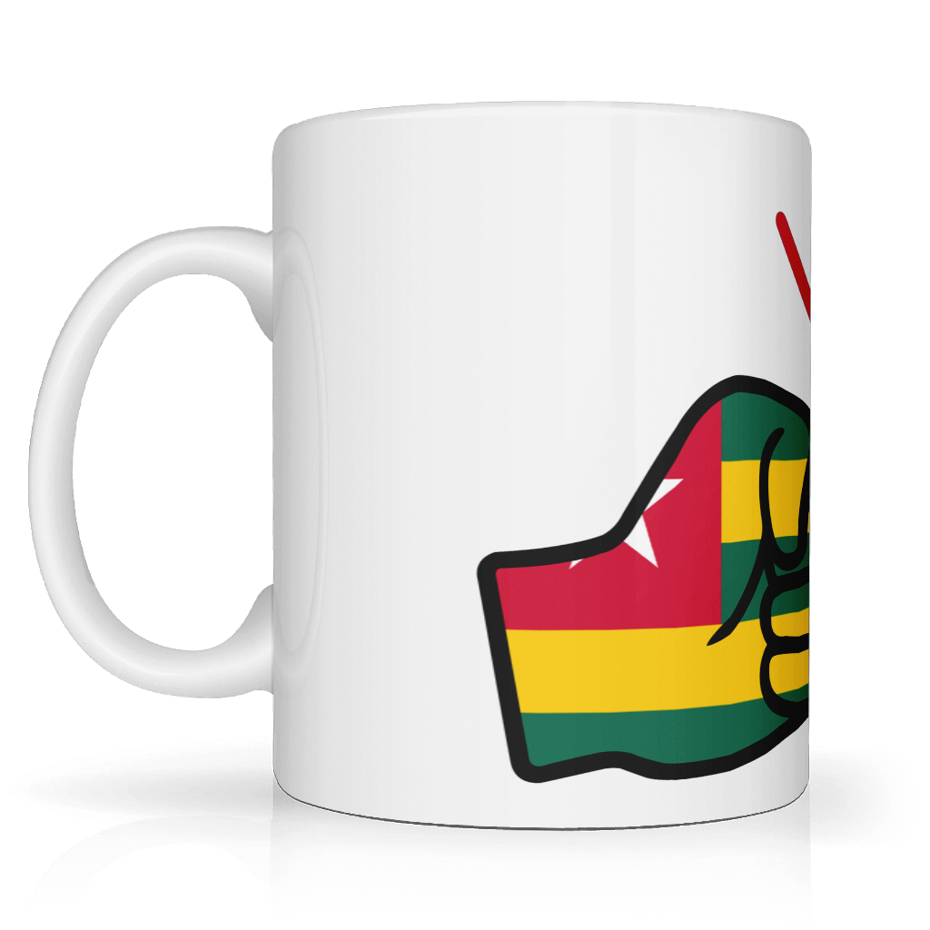 White ceramic mug featuring a bold “We Run Tings” design with two raised fists wrapped in the Togo flag colors, accented by red graphic lines above, symbolizing strength, unity, and cultural pride. Side view on a white background