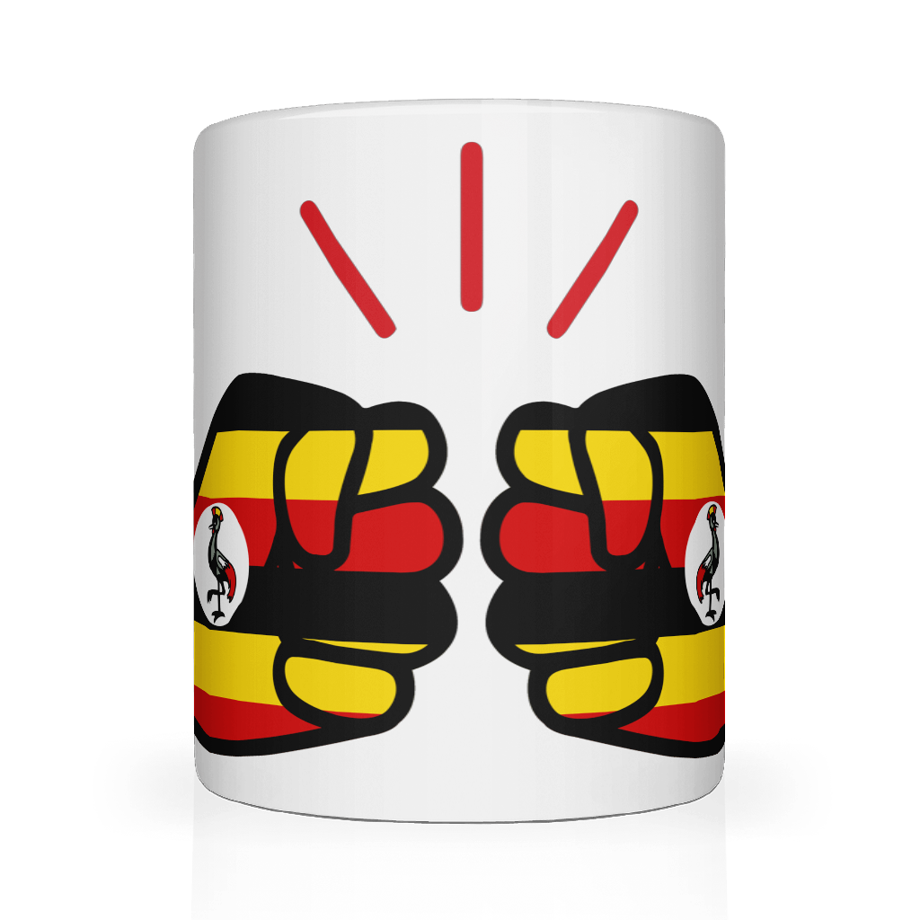 A glossy white ceramic We Run Tings, Uganda tea, coffee mug with a graphic design of clenched fists in yellow, red, and black colors, representing the 'We Run Tings' brand.
