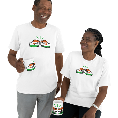 A black African couple wearing Niger themed We Run Ting merchandise. Both holding white ceramic tea coffee mugs, cups and white branded t-shirts.