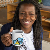 Woman holding a We Run Tings, St Lucia, St. Lucian Caribbean Themed, Tea, Coffee Ceramic Mug, Cup, 11oz Classic Drinkware Washable Reusable Reuse Glossy Tumbler Patriotic mug with a logo in a casual indoor setting
