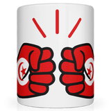 A glossy white ceramic mug with a graphic design of the flag and fist and a star, representing Tunisia, on the side.