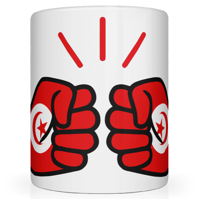 A glossy white ceramic mug with a graphic design of the flag and fist and a star, representing Tunisia, on the side.