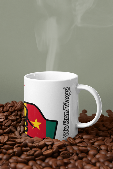 We Run Tings White mug with a flag of Cameoron on coffee beans