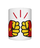 Glossy white ceramic mug featuring a patriotic We Run Tings logo with two fists displaying the flag of Cameroon. Front view