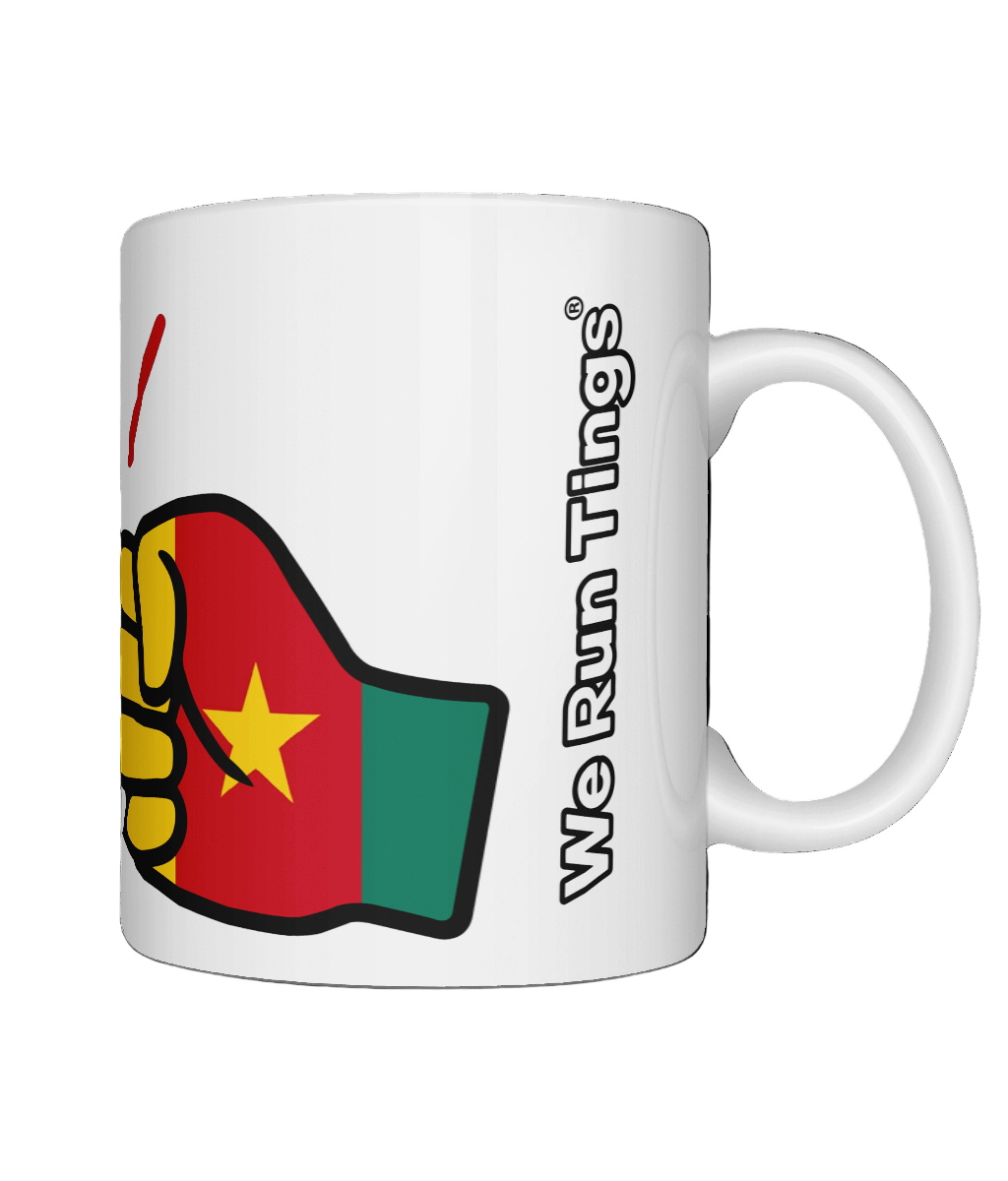 Glossy white ceramic mug featuring a patriotic We Run Tings logo with two fists displaying the flag of Cameroon. Right view