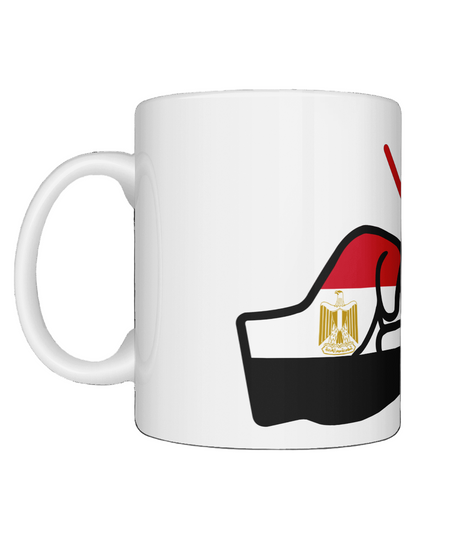 A glossy white ceramic mug with a graphic design of the Egyptian flag and the brand 'We Run Tings'.