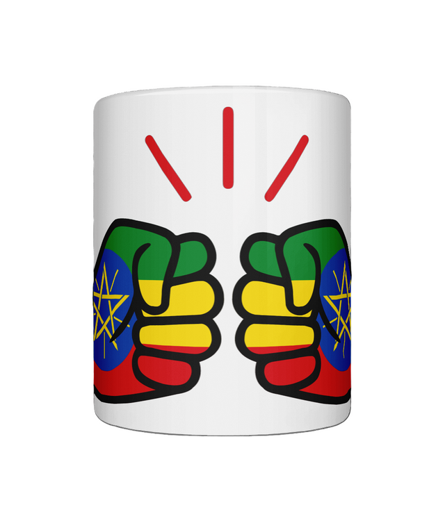 A glossy white We Run Tings Ethiopia Mug ceramic mug with a graphic design of fists in different colors on the side. On a white background