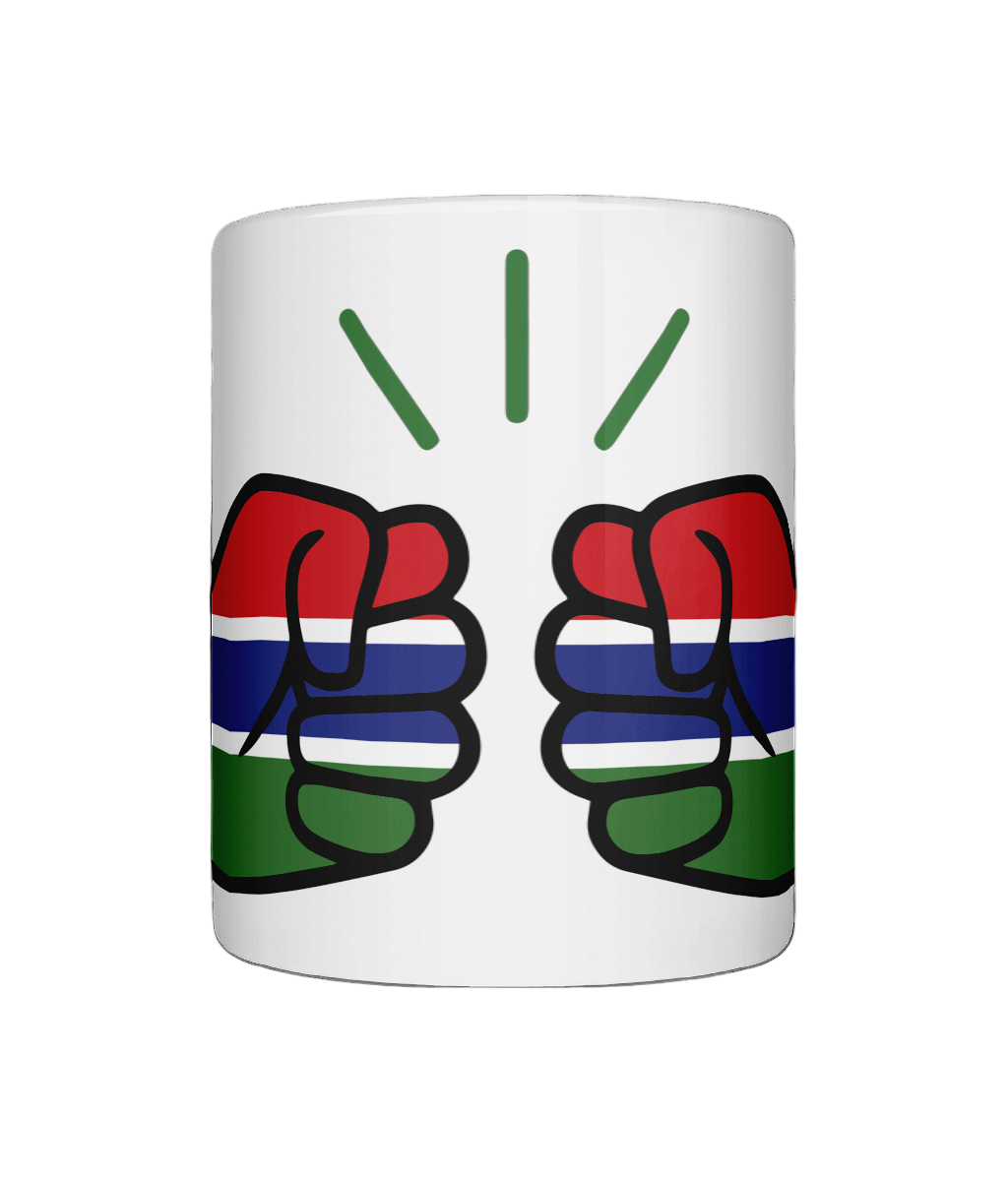 Glossy white ceramic mug featuring a patriotic We Run Tings logo with two fists displaying the flag of Gambia on a white background.