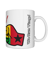 A glossy white ceramic We Run Tings Comoros Mug with a graphic design of a fist and the colors of the Guinea-Bissau flag and Brand name on the side. white background.  Front view