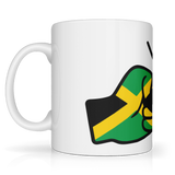 Jamaica themed White mug with a design of a hand giving a thumbs up in green and yellow on a white background