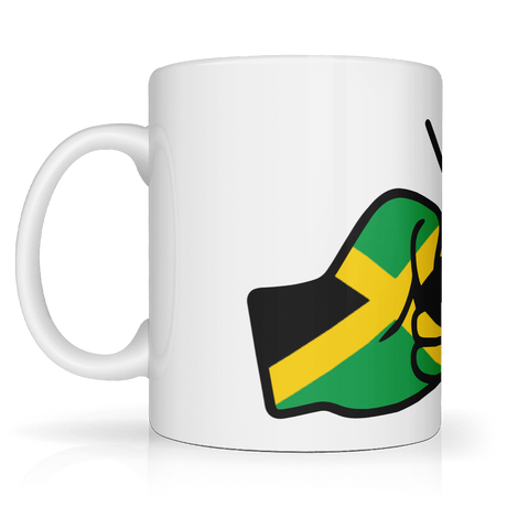 Jamaica themed White mug with a design of a hand giving a thumbs up in green and yellow on a white background