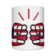 A white ceramic We Run Tings Liberia mug with a graphic design of two fists representing strength or power on a glossy finish. Front view on a white background.