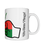 A glossy white ceramic We Run Tings Madagascar coffee ceramic Mug with a graphic design of a fist and the colors of the Madagascar flag. Front view