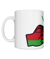 A glossy white ceramic coffee We Run Tings Malawi Mug with a graphic design of a fist and the colors of the Malawi flag. Front view