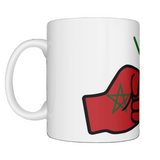 Glossy white ceramic coffee, tea mug, cup featuring a patriotic We Run Tings logo with two fists displaying the flag of Morocco