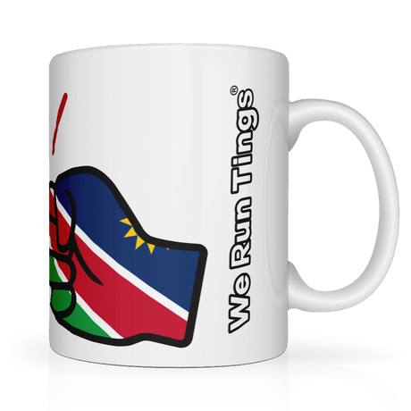 We Run Tings, Namibia Mug, 11oz / 313ml premium ceramic mug. Glossy white finish for a sleek, modern look. Comfortable easy-grip handle. Suitable for hot and cold beverages. Side view showing the brand name We Run Tings.