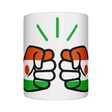 A glossy white ceramic We Run Tings Niger coffee, tea, mug, cup with a graphic design of a fist and the colors of the Niger flag.