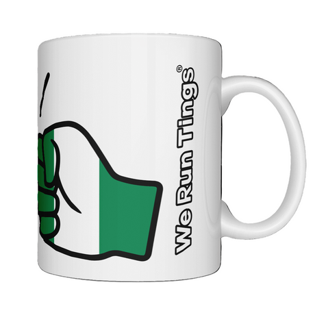 A glossy white ceramic coffee/tea mug, cup with a graphic design of the flag of Nigeria and the brand logo of  'We Run Tings'. Side view on a white background.