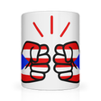 A glossy white We Run Tings ceramic mug with a graphic design of a fist and the colors of the Puerto Rican flag.