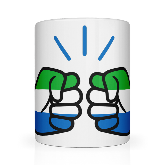 A glossy white ceramic coffee, tea mug with a graphic design of a fist featuring the We Run Tings Logo and the colors of the Sierra Leone flag, indicating a theme or message related to the country.