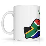 A glossy white ceramic We Run Tings, South Africa mug with a graphic design of two clenched fists and the South African flag. side view.