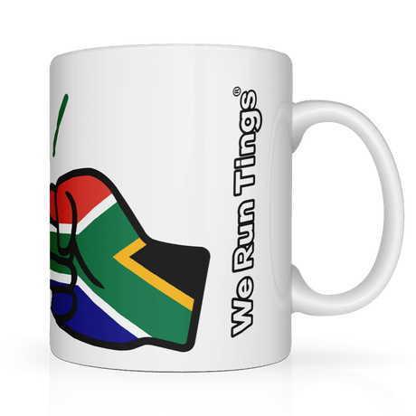 White ceramic mug with a graphic of the flag of South Africaa and 'We Run Tings' text on a white background. Side view