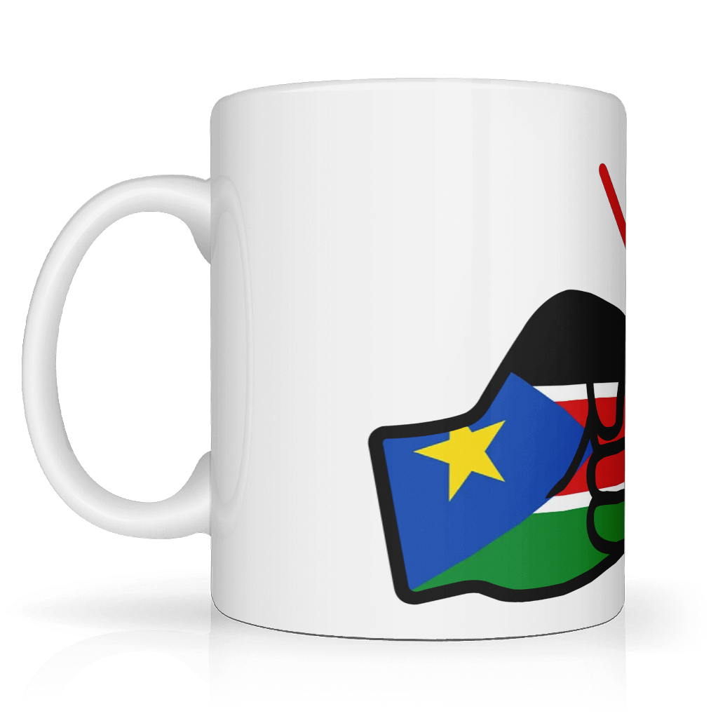 A white We Run Tings ceramic mug with a glossy finish featuring the brand logo design of clenched fists and the flag of South Sudan. Side view.