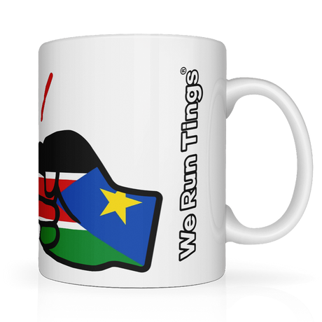 White ceramic mug with a colorful design of the flag of South Sudan and 'We Run Ting's' text on a white background