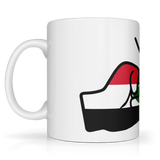 White ceramic We Run Tings, Sudan Mug with a graphic of a fist and the text on a white background. Side view
