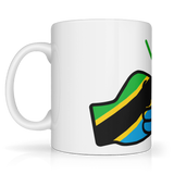 White We Run Tings, Tanzania tea, coffee ceramic mug, cup featuring the flag of Tanzania within the We Run Tings fist logo on a white background. Side view