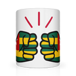 White ceramic mug featuring a bold “We Run Tings” design with two raised fists wrapped in the Togo flag colors, accented by red graphic lines above, symbolizing strength, unity, and cultural pride.